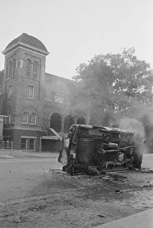 Bombed Car in Front of Church