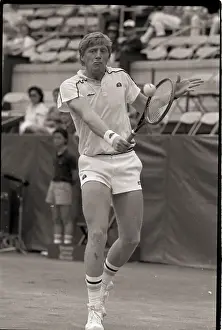 Boris Becker Straining to Hit Ball