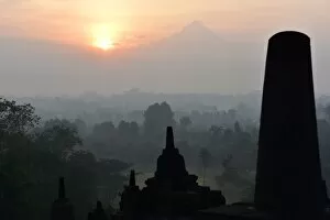 Images Dated 8th June 2015: Borobudur at dusk, view on Merapi, Java