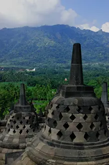 Yogyakarta Prints: Borobudur stupas overlooking a mountain