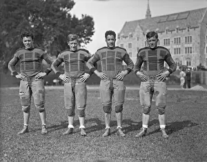 Boston College Football Teammates Posing on Field
