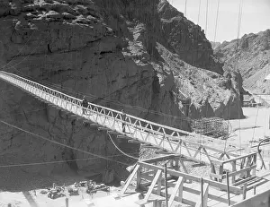 Prints of (Original Caption) 1933-Boulder City, CO- Picture shows a view of a bridge crossing at the Boulder Dam (known now as the Hoover Dam) A Timeless Collection of Hoover Dam Photography: Boulder Dam