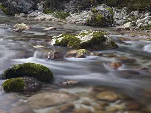 Riverbed Prints: Boulders and rocks in the river bed of the Soca river in Soca Valley near Bovec