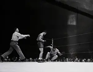 Boxer Abe Simon Falling to the Canvas
