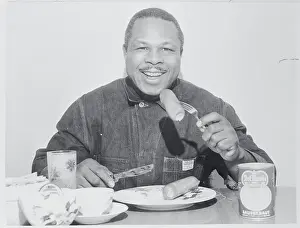 Sauerkraut Prints: Boxer Archie Moore Eating German Meal