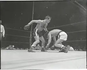 Boxer Chavez Falling from Punch by Paddy De Marco