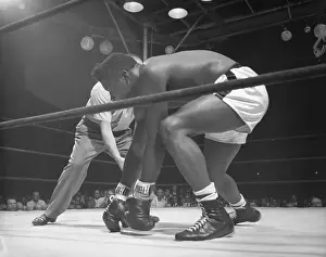 Boxer Floyd Patterson Trying to Stand During Match
