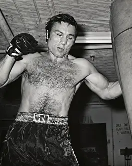 Practice Prints: Boxer George Chuvalo Hitting Punching Bag
