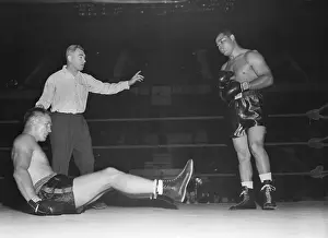 Boxer Goes Down in Match with Joe Louis