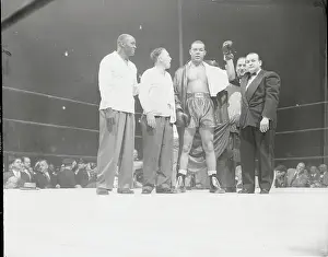 Boxer Joe Louis and Peers After His Win