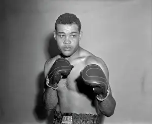 Boxer Joe Louis Wearing Boxing Gloves