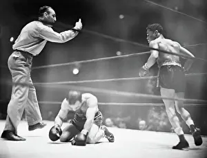 Boxer Kneeling on Canvas After Knock Out