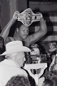 Title Prints: Boxer Larry Holmes Holding Title Belt