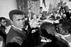 Boxer Muhammad Ali Speaking with Press