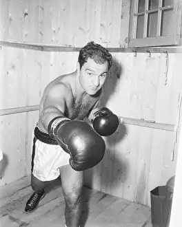Retirement Prints: Boxer Rocky Marciano Punches In Portrait