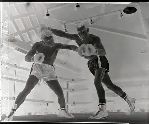 Boxers in Action With High Drive Moves