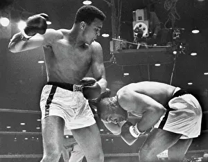Boxers Cassius Clay and Sonny Liston Fighting