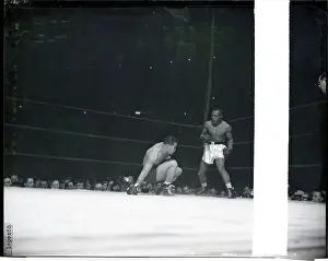 Boxers Joe Louis and Joe Walcott Fighting