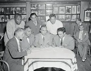 Boxers and Officials in Conference