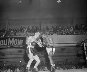 Boxers in Punching Action in the Ring