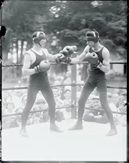 Boxers Sparring in Ring