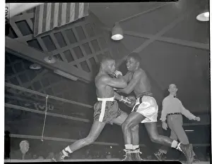 Boxers Teddy Davis and Percy Bassett in Action