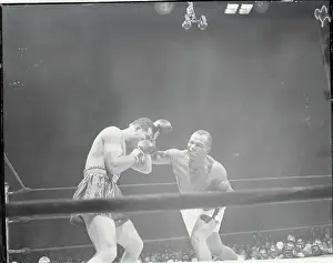 Boxing Champion Joe Louis Dodging Joe Walcott