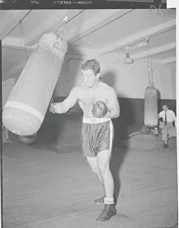 Rocky Marciano Training Print: Punching Bag in New Art