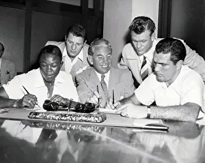 Rivalry Prints: Boxing Champs Signing Contracts