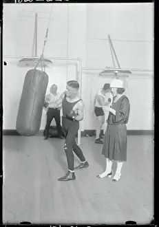 Endurance Prints: Boxing Promoter Florence North with Boxer in Gym
