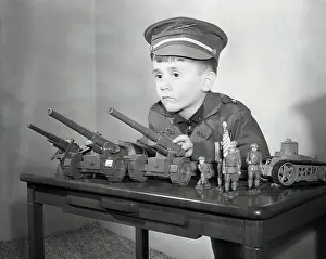 Thinking Prints: Boy (6-7) with Military Toys