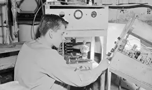 Oakland Prints: Boy Adjusting an Oscilloscope