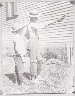Caution Prints: Boy Aiming a Revolver