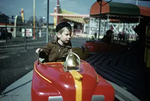 Dmitriupload1 Prints: Boy At Amusement Park