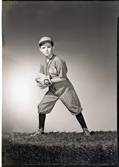 Boy in Baseball Uniform