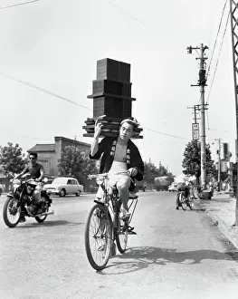 Delivery Prints: Boy On Bicycle Carrying Lots Of Noodles