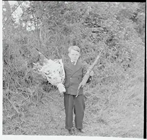 Boy with Bouquet for His Slain Friend