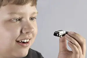Miniature Prints: Boy with a car model