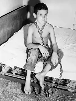 Oppression Prints: Boy Chained by Neck to His Bed