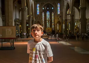 Images Dated 17th May 2016: A boy in the church Santa Croce