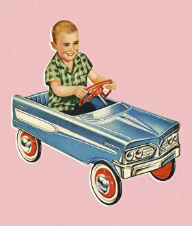 Boy Driving a Kiddie Car