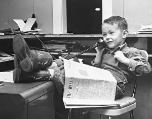 Richard B Prints: Boy with His Feet Propped at Desk