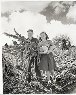 Corn Prints: Boy and Girl Carrying Corn and Pumpkins