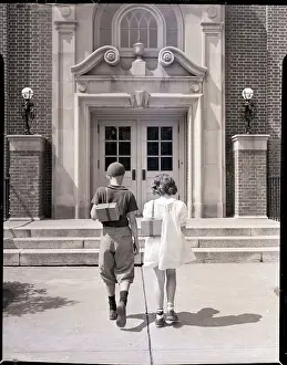 Boy and Girl Going to School