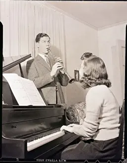 Sheet Music Prints: Boy and Girl Playing Instruments