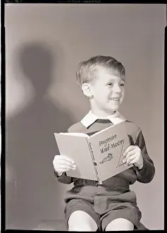 Sweater Prints: Boy Holding Book