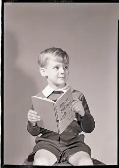 Sweater Prints: Boy Holding Book