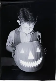 Halloween Prints: Boy Holding Jack-o'-lantern