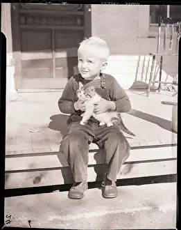 Boy Holding Kitten