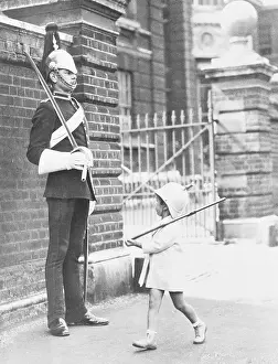 Guarding Prints: Boy Imitating British Guard